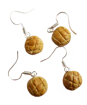 Two pairs of melon bread earrings.